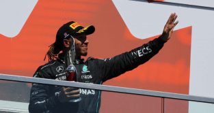 Lewis Hamilton holds his trophy aloft. Canada June 2022.