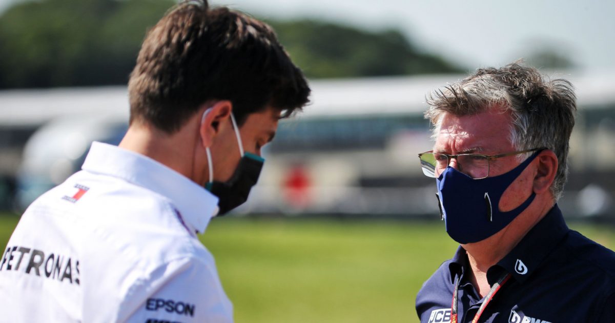 Otmar Szafnauer, then of Racing Point, speaks with Mercedes' Toto Wolff. Britain July 2020