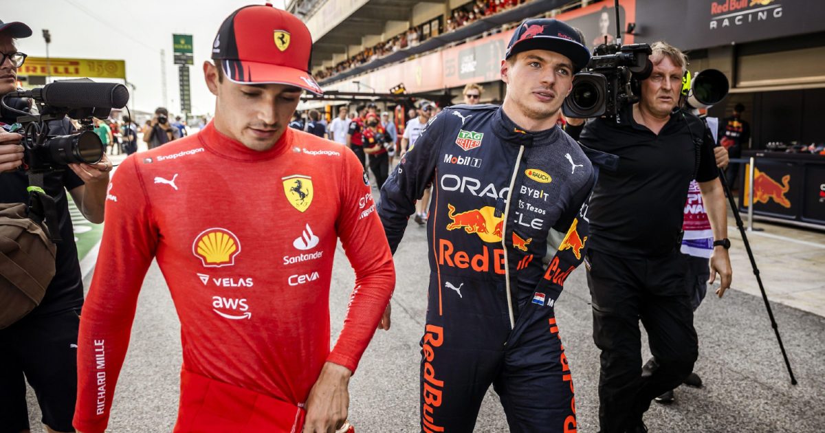 Red Bull's Max Verstappen and Ferrari's Charles Leclerc walking together in the Barcelona pitlane. Barcelona, May 2022.