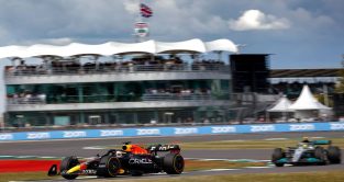 Max Verstappen's Red Bull ahead of a Mercedes at the British GP. Silverstone July 2022.