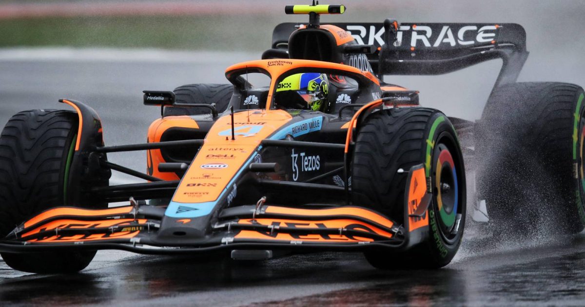 Lando Norris, McLaren, drives in the rain. England, July 2022.