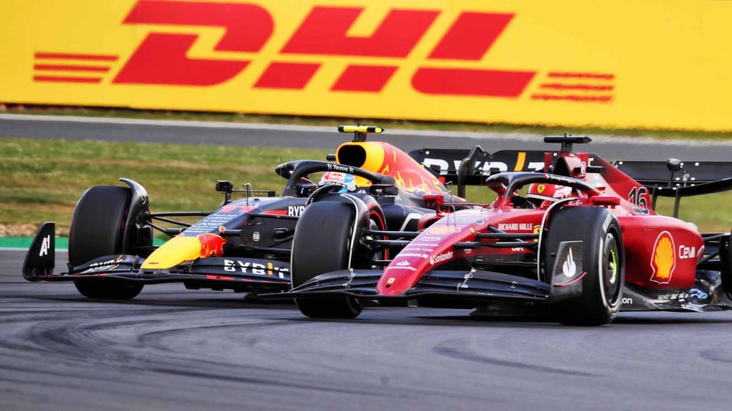 Sergio Perez battles Charles Leclerc. Silverstone July 2022.