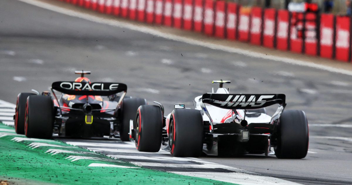 Haas' Mick Schumacher chasing Red Bull's Max Verstappen at the British Grand Prix. Silverstone, July 2022.