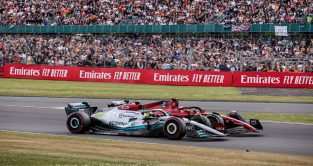 Mercedes' Lewis Hamilton battles Ferrari's Charles Leclerc during the British Grand Prix. Silverstone, July 2022.