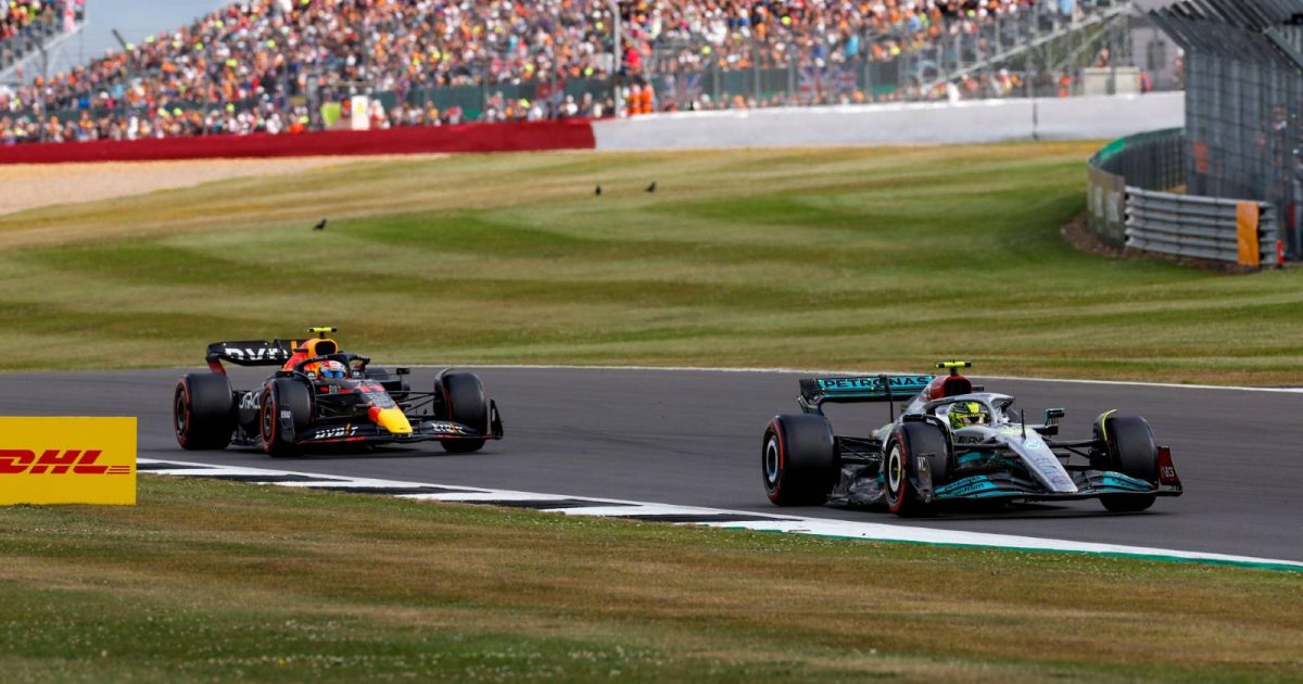 Lewis Hamilton's Mercedes ahead of Sergio Perez's Red Bull. Silverstone July 2022.
