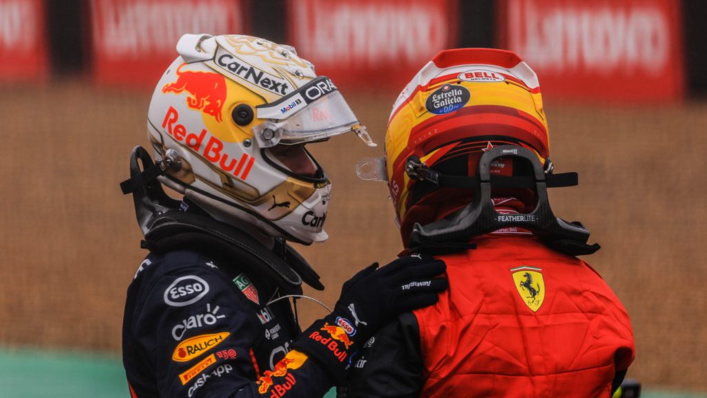 Max Verstappen pats Carlos Sainz on the back. Silverstone July 2022