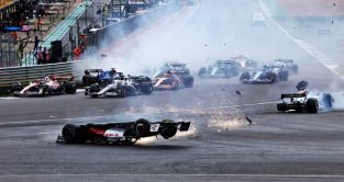 Zhou Guanyu crashes on the opening lap of the grand prix. Silverstone July 2022