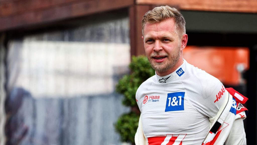 Kevin Magnussen taking off his race suit in the paddock. Melbourne April 2022