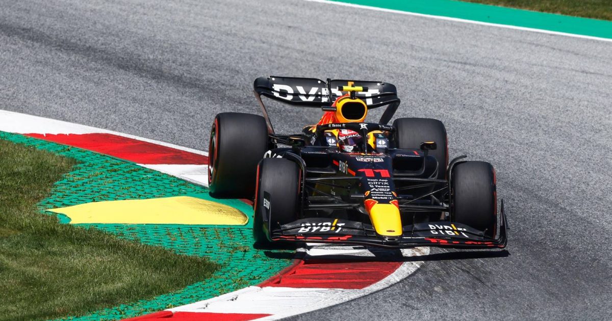 Sergio Perez's Red Bull on the kerb at the Austrian GP. Red Bull Ring July 2022.
