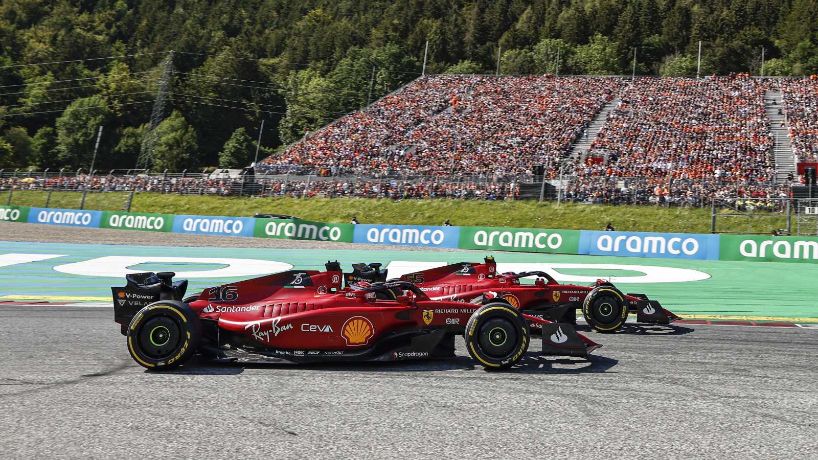 Ferrari drivers Carlos Sainz and Charles Leclerc battle. Austria, July 2022.