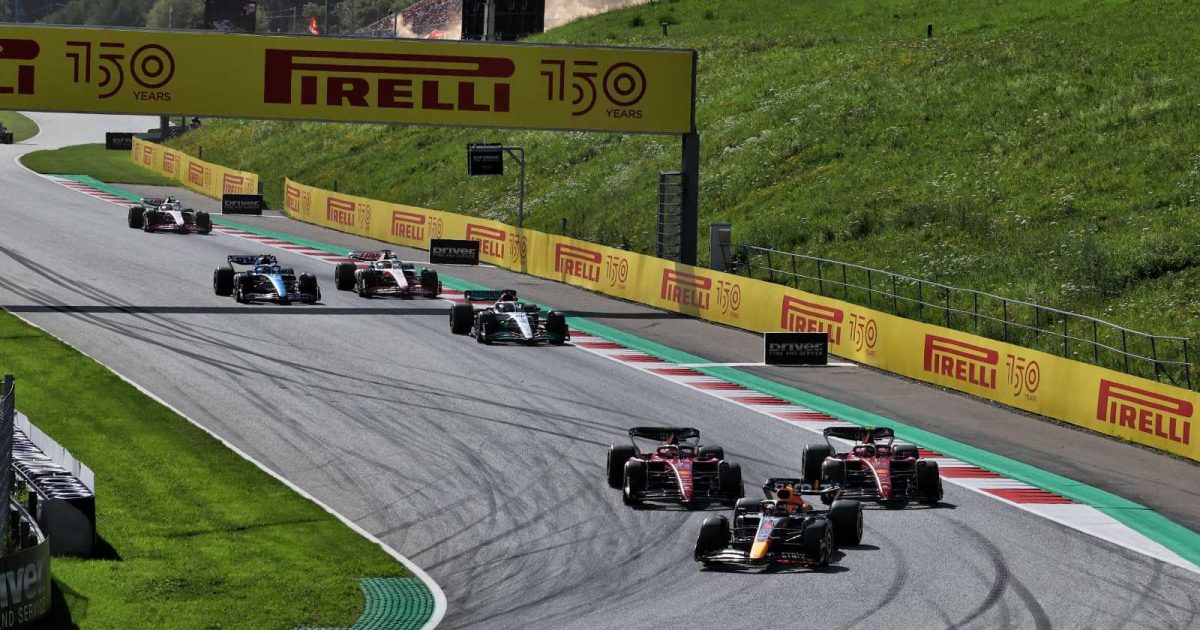 Carlos Sainz and Charles Leclerc, Ferrari, chase Max Verstappen, Red Bull. Austria, July 2022.