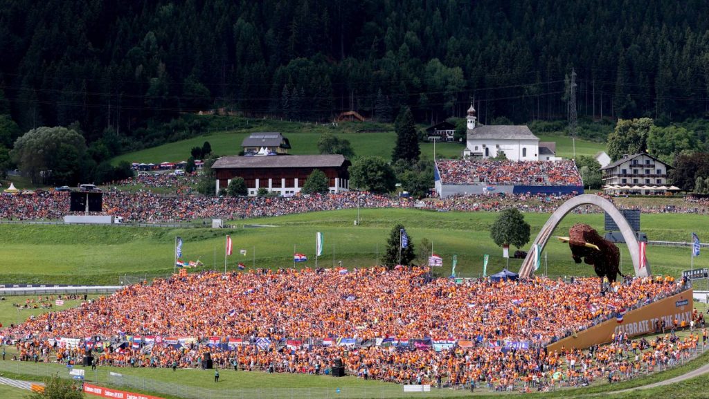 Fans in a grandstand at the Austrian GP. Red Bull Ring July 2022.