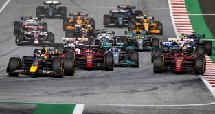 Red Bull's Max Verstappen leads into Turn 1 at the Austrian Grand Prix. Spielberg, July 2022. F1 results