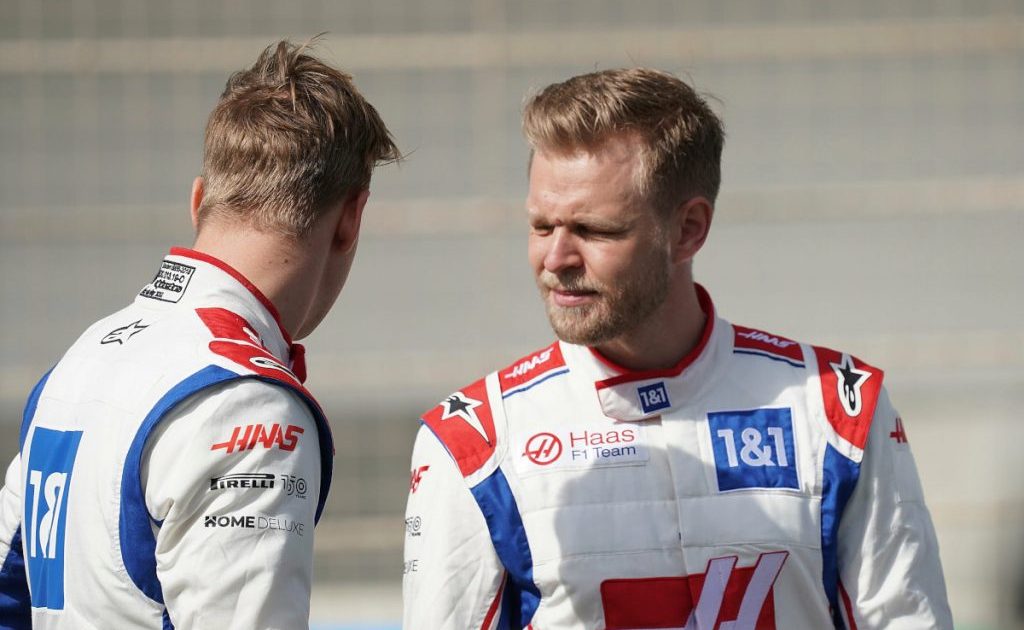 Kevin Magnussen speaking with his 2022 Haas team-mate Mick Schumacher. Bahrain March 2022