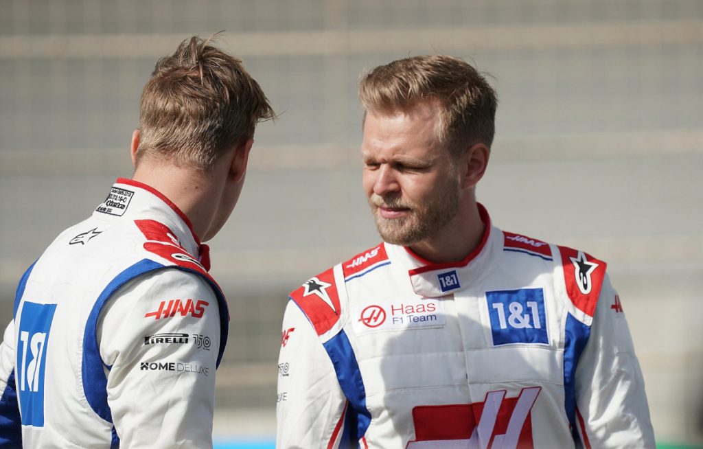 Kevin Magnussen speaking with his 2022 Haas team-mate Mick Schumacher. Bahrain March 2022