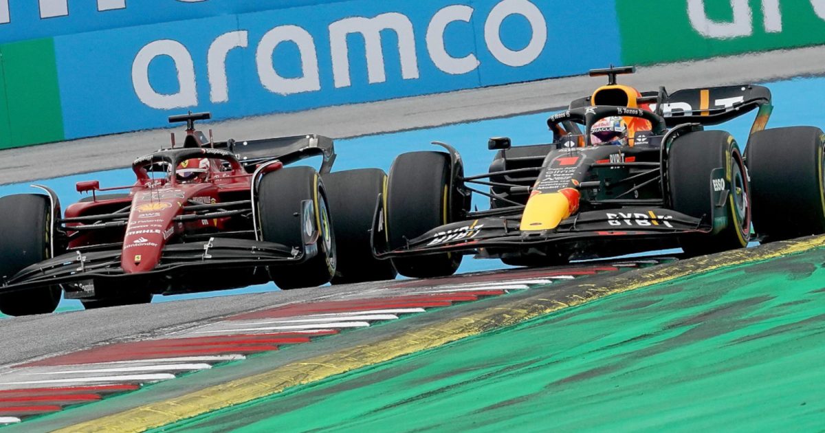 Charles Leclerc racing against Max Verstappen side by side. Austria July 2022