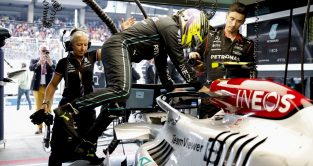 Lewis Hamilton hops in his W13 in the garage. Austria July 2022