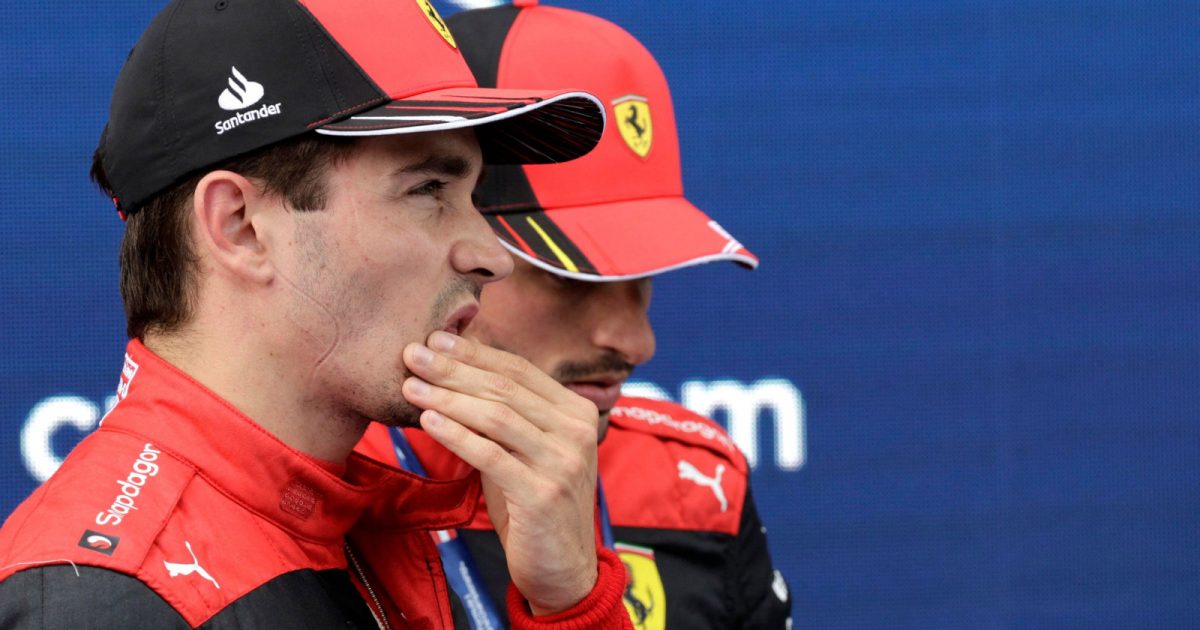 Charles Leclerc standing next to Ferrari team-mate Carlos Sainz. Austria July 2022