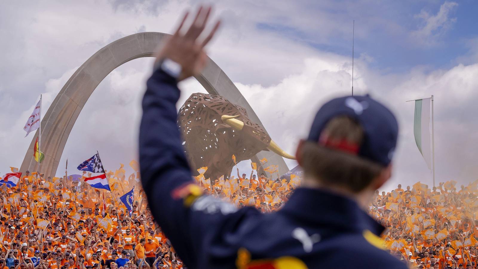 Max Verstappen waves to fans at the Austrian GP. Red Bull Ring July 2022.