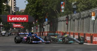 Esteban Ocon's Alpine alongside Lewis Hamilton's Mercedes. Baku June 2022.