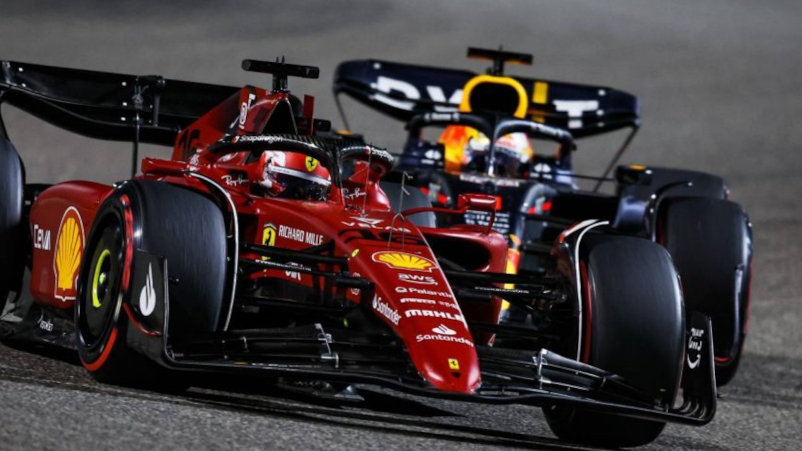 Charles Leclerc defending against Max Verstappen. Bahrain March 2022