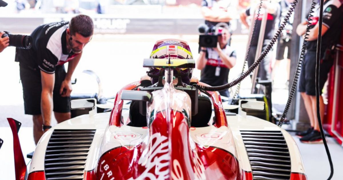 Zhou Guanyu sitting in his Alfa Romeo in the garage. Monaco May 2022