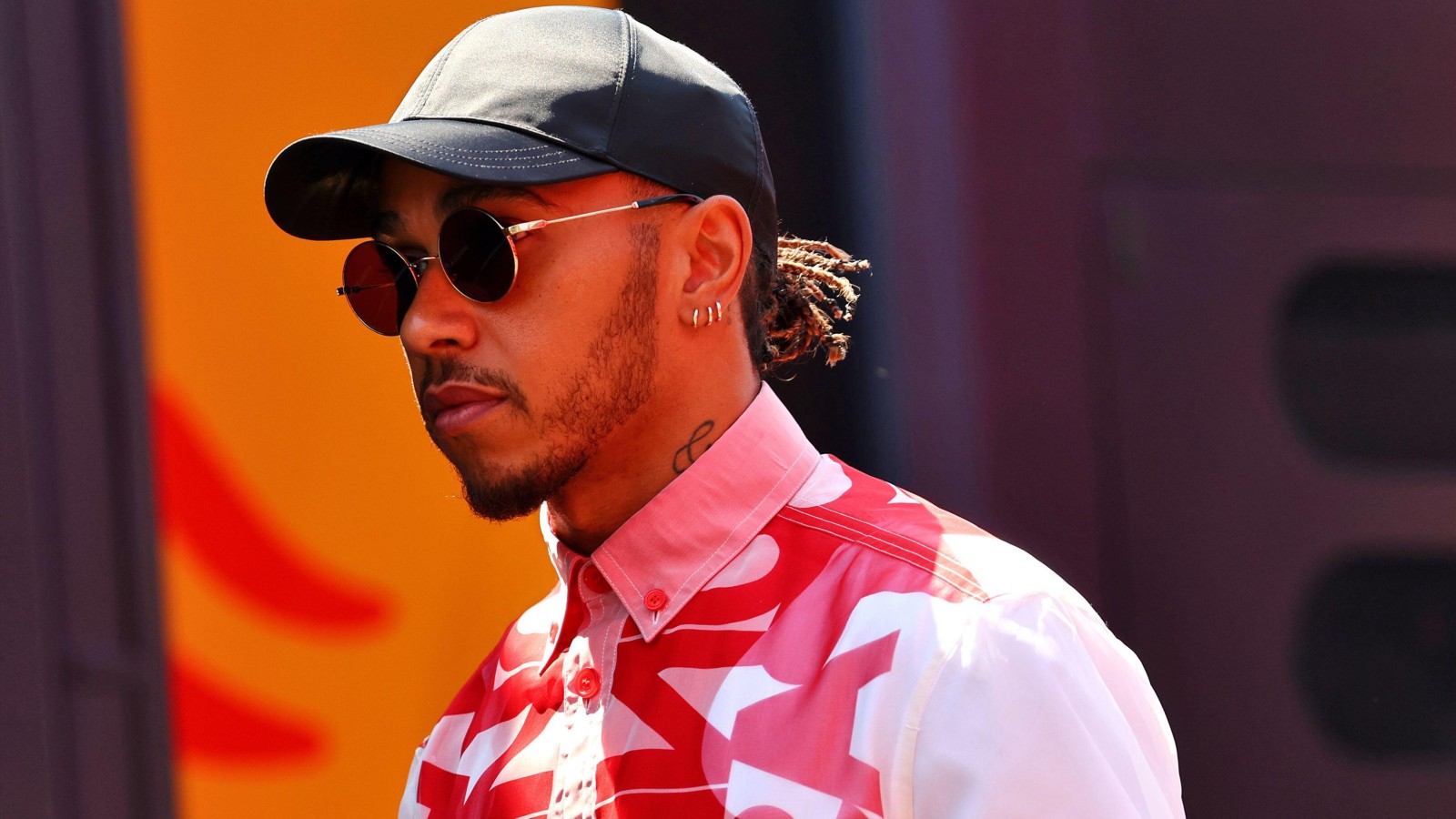 Lewis Hamilton, Mercedes, wears street clothes in the paddock. France, July 2022.