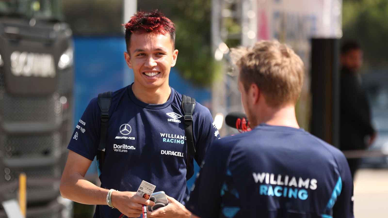 Williams driver Alex Albon arrives in the paddock. France July 2022.