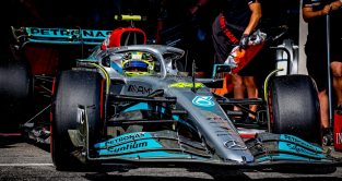 Lewis Hamilton pulls out of the garage, visor up. France July 2022
