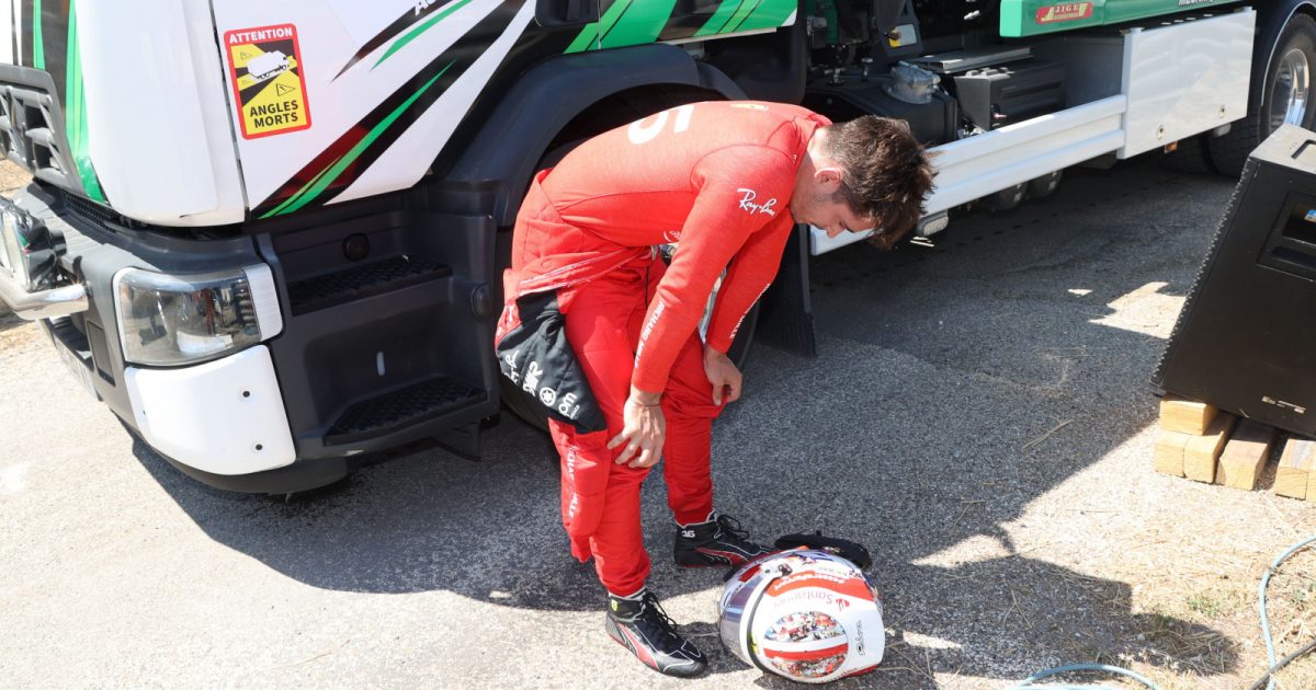 Charles Leclerc has his hands on his knees after his crash. France July 2022