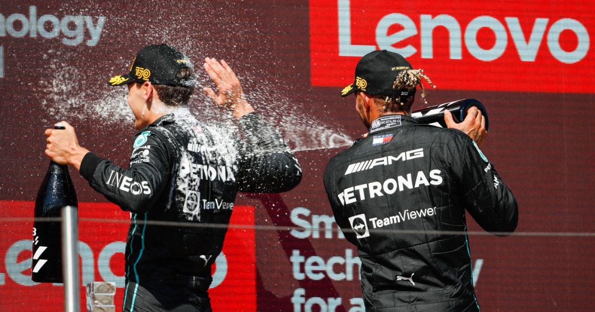 Lewis Hamilton sprays George Russell on the podium. France July 2022