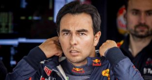 Sergio Perez looking focused as he prepares for a session. Silverstone July 2022.