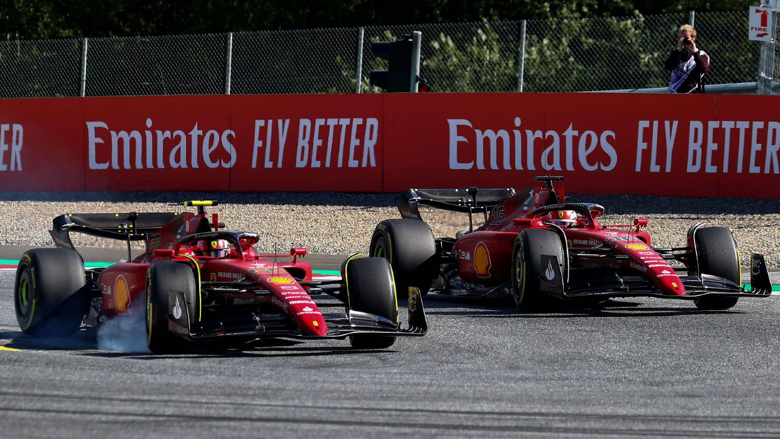The Ferrari duo Charles Leclerc and Carlos Sainz battle.  Red Bull Ring July 2022.