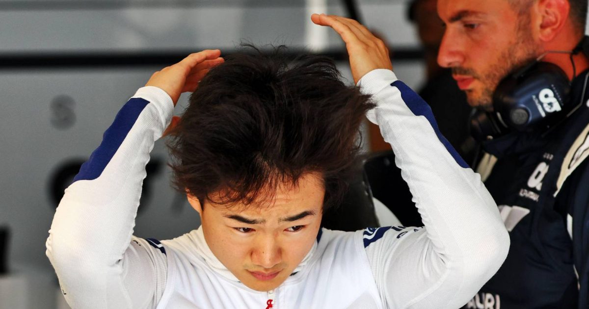 Yuki Tsunoda ruffling his hair. Paul Ricard July 2022.
