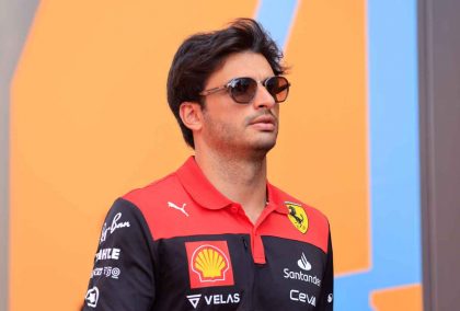 Carlos Sainz walks outside the McLaren motorhome. France qualifying July 2022.