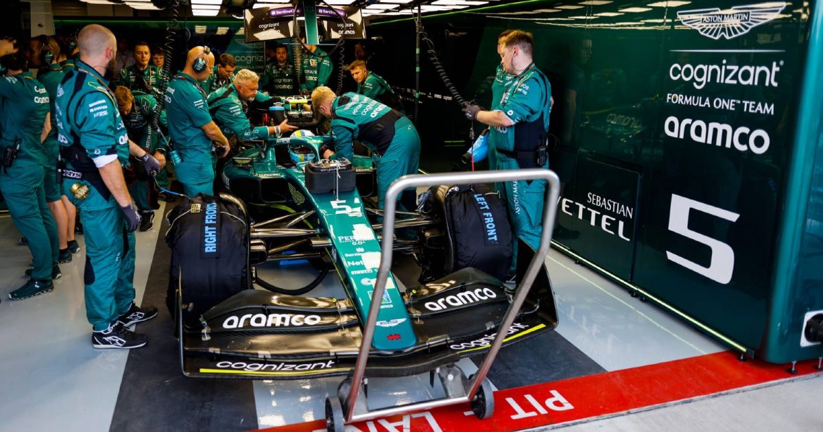 Aston Martin work on Sebastian Vettel's car. Miami May 2022.