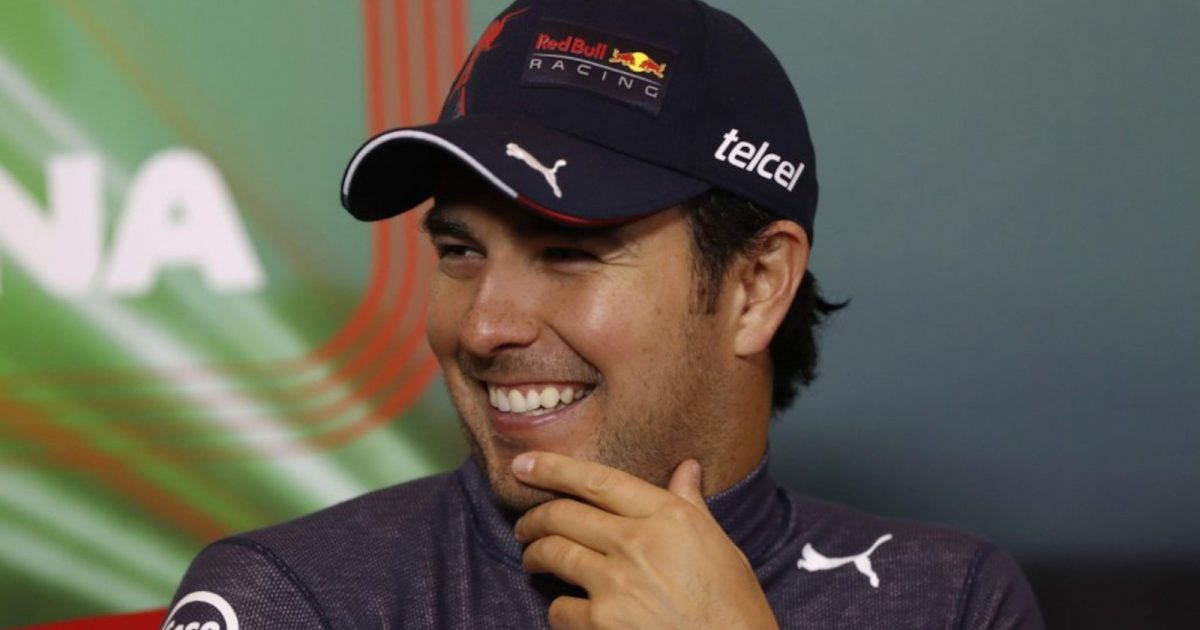 Sergio Perez laughing during a press conference. Imola April 2022