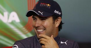 Sergio Perez laughing during a press conference. Imola April 2022