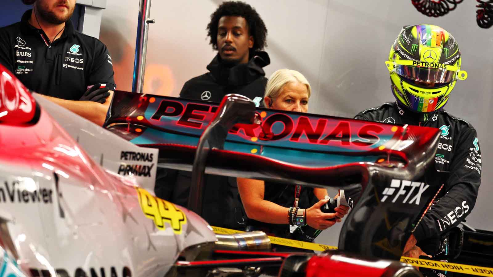Lewis Hamilton stood behind his Mercedes. Hungary July 2022.