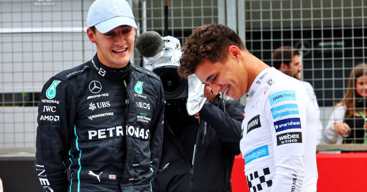 George Russell and Lando Norris share a joke. Silverstone July 2022.