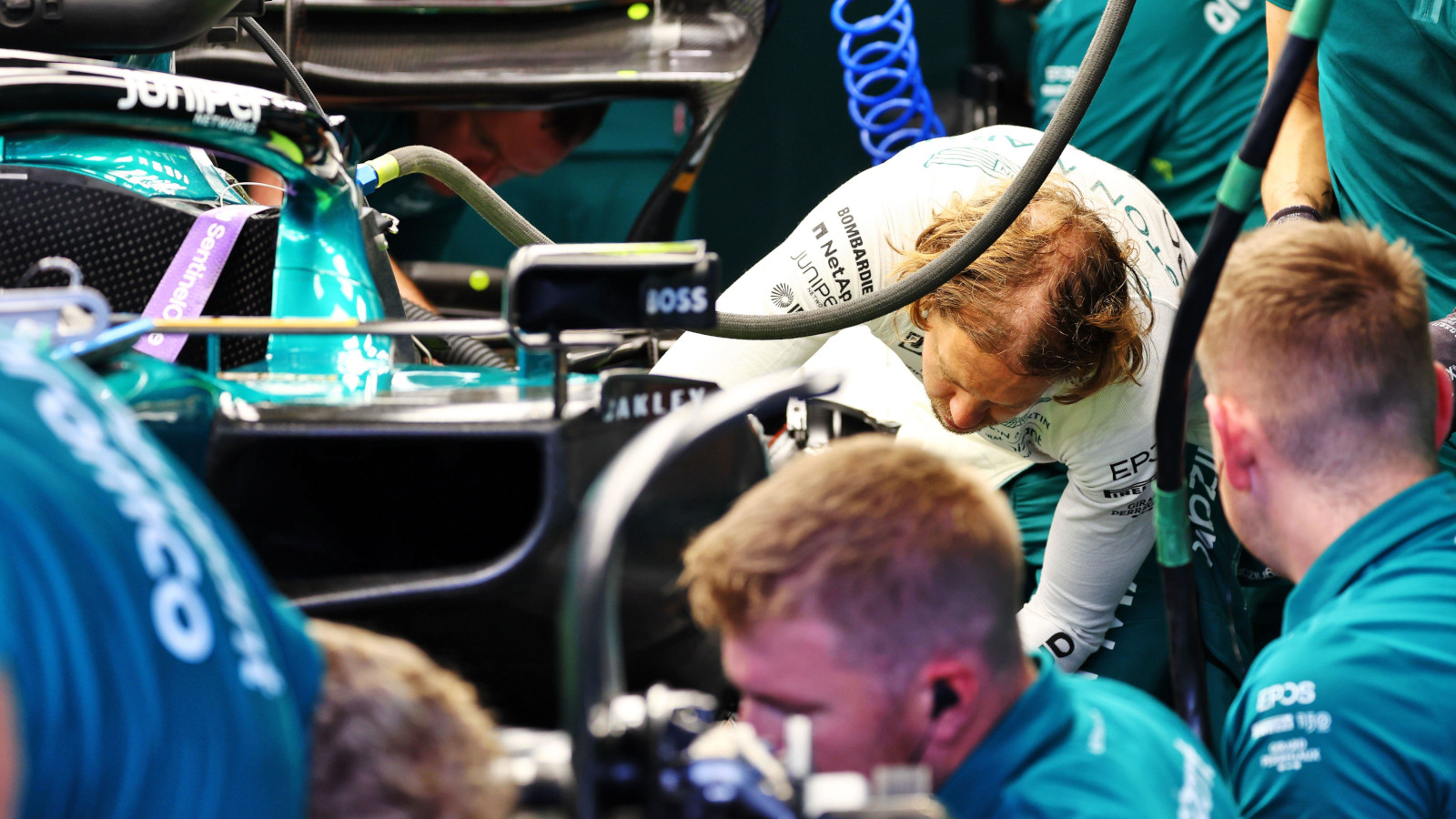 Sebastian Vettel helping repair his AMR22. Hungary July 2022