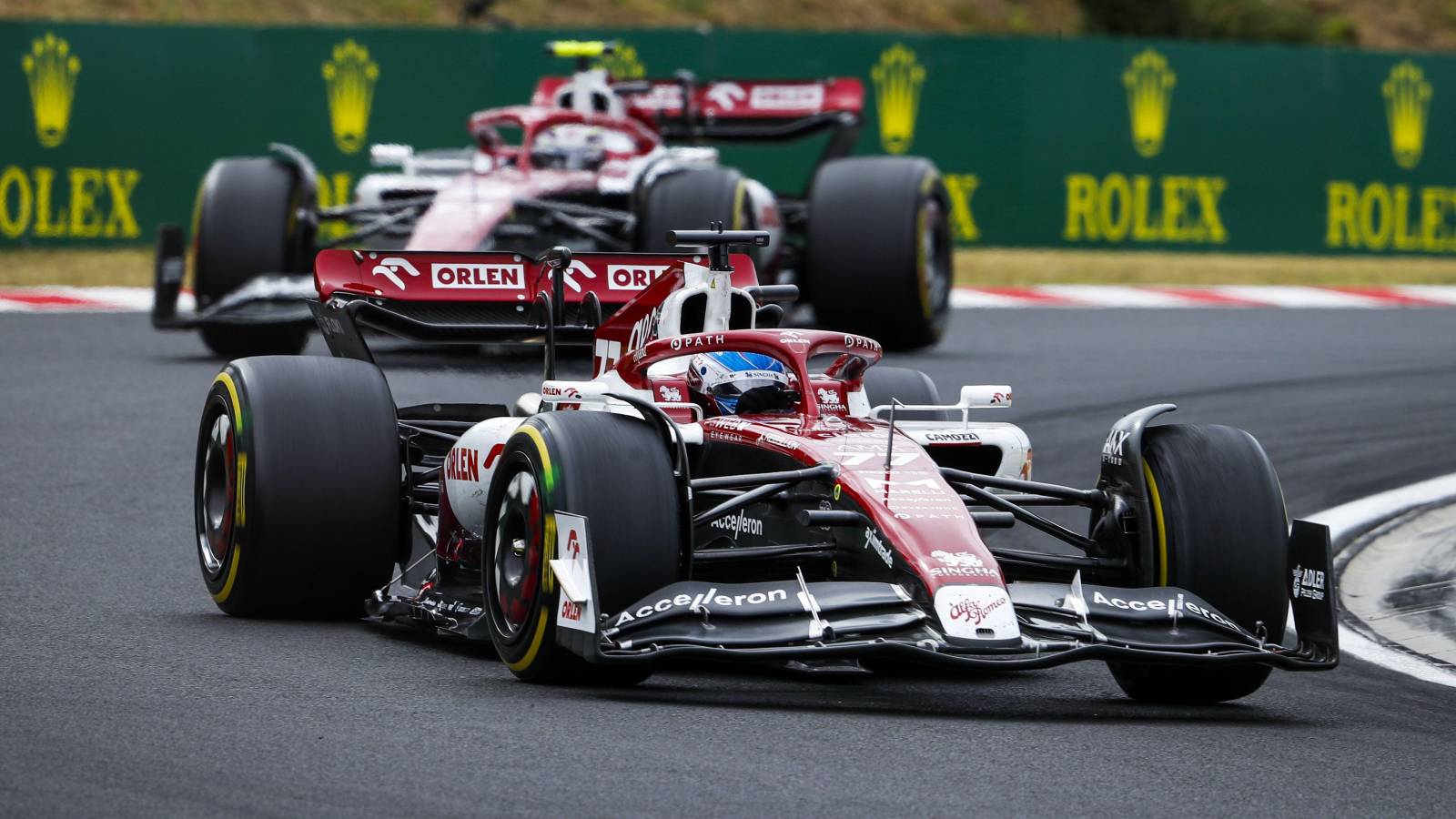 Valtteri Bottas, ahead of Alfa Romeo team-mate Zhou Guanyu. Hungary, July 2022.