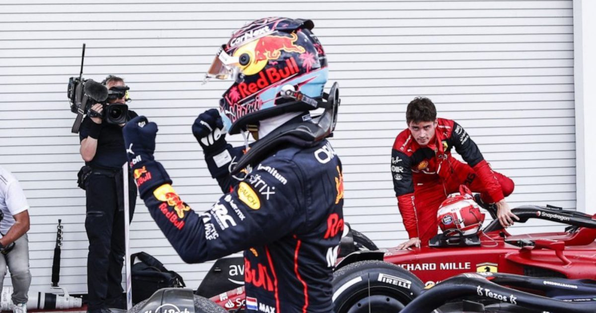 Max Verstappen celebrates as Charles Leclerc watches. Miami May 2022