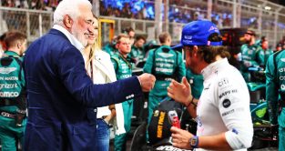 Lawrence Stroll greets Fernando Alonso on the grid. Jeddah March 2022.