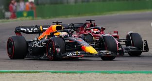 Max Verstappen as he overtakes Charles Leclerc for the lead. Imola April 2022