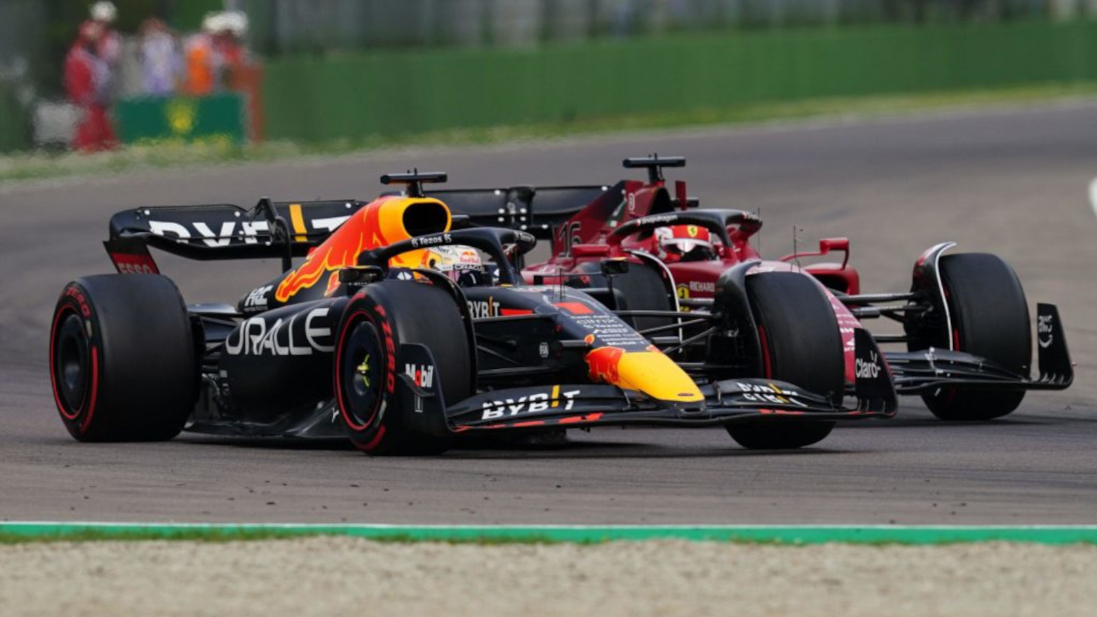 Max Verstappen as he overtakes Charles Leclerc for the lead. Imola April 2022