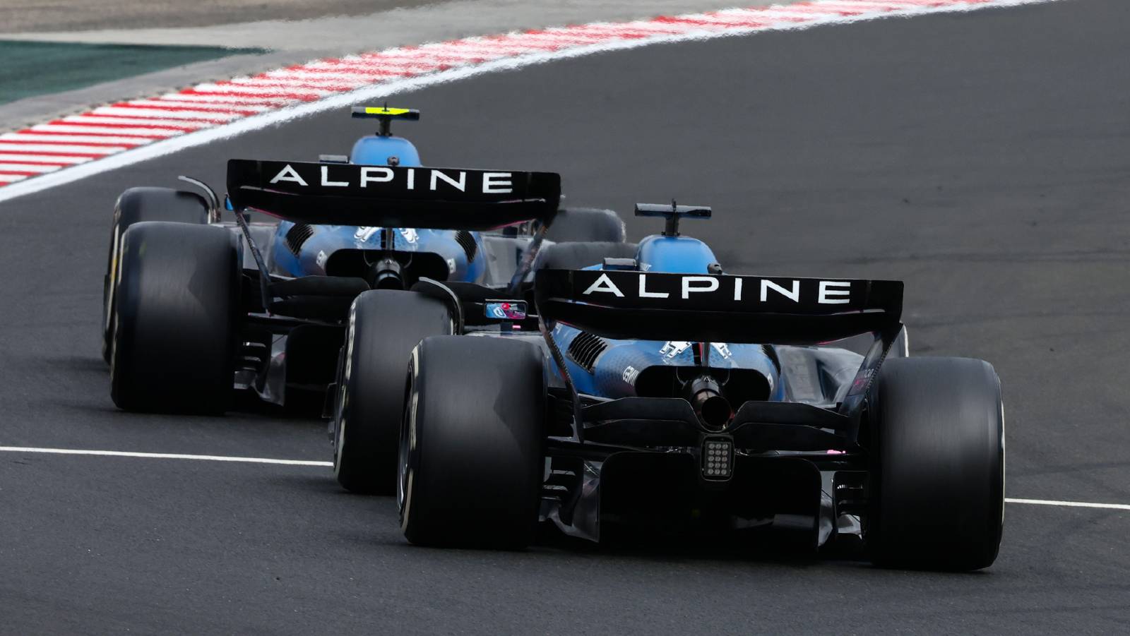 Esteban Ocon just ahead of Fernando Alonso. Hungaroring July 2022.