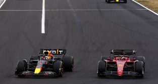 Red Bull's Max Verstappen overtakes Ferrari's Charles Leclerc during the Hungarian Grand Prix. Budapest, July 2022.