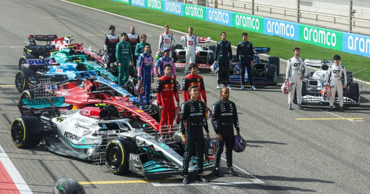 F1 drivers line up next to their cars. Bahrain March 2022.