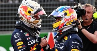 Red Bull driver Max Verstappen shakes hands with his team-mate Sergio Perez. Australia April 2022